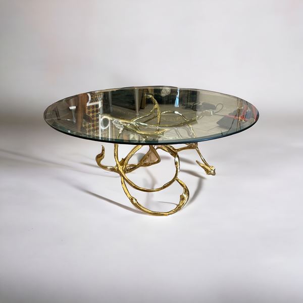 Tavolino con base in ottone e piano in cristallo