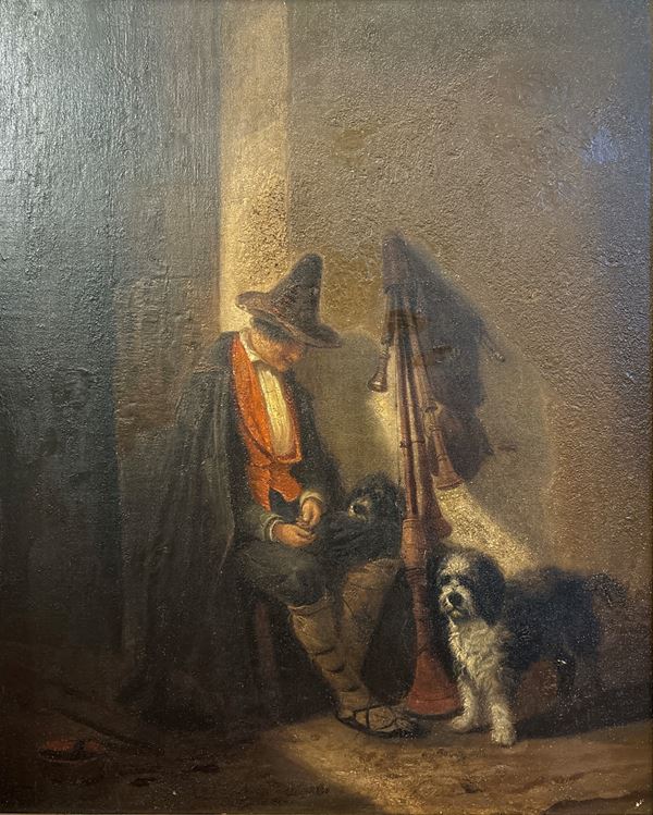 Zampognaro con cani