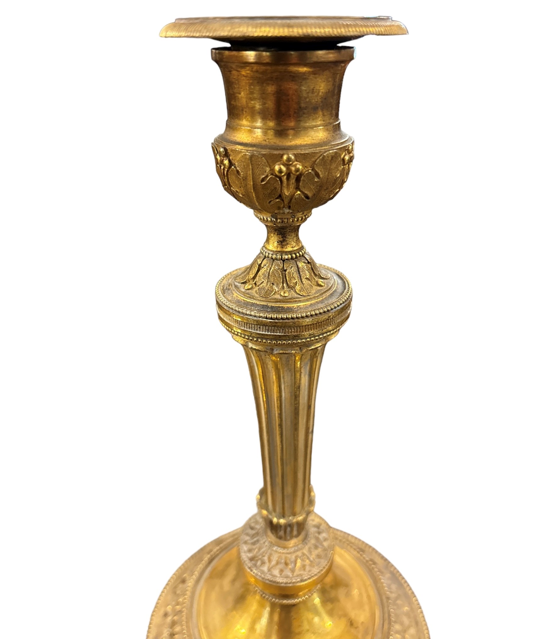 Due Coppie di candelieri in bronzo dorato