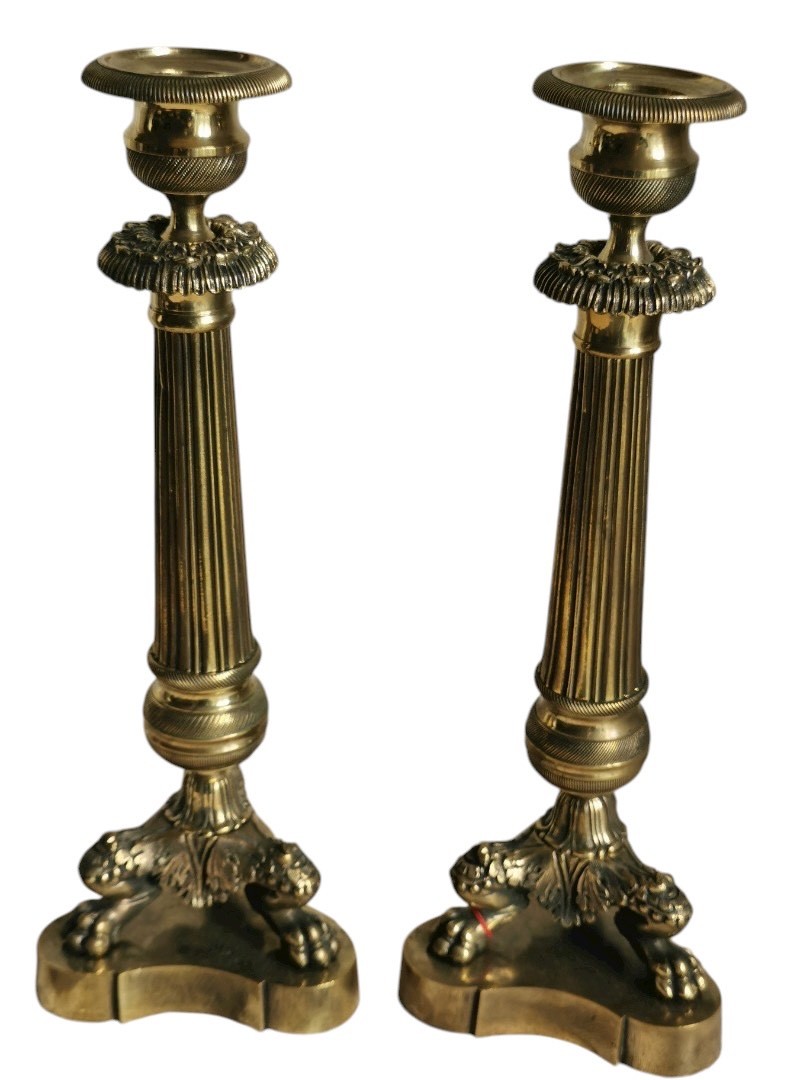 Due Coppie di candelieri in bronzo dorato