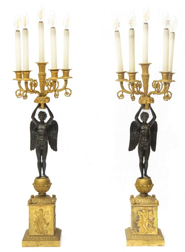 Coppia di candelabri a cinque fiamme