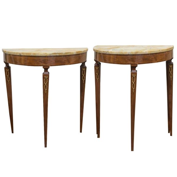 Pair of small crescent-shaped consoles