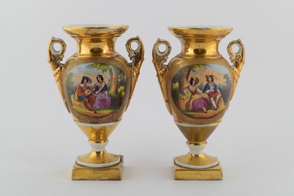 Coppia di vasi di porcellana forma a balaustro