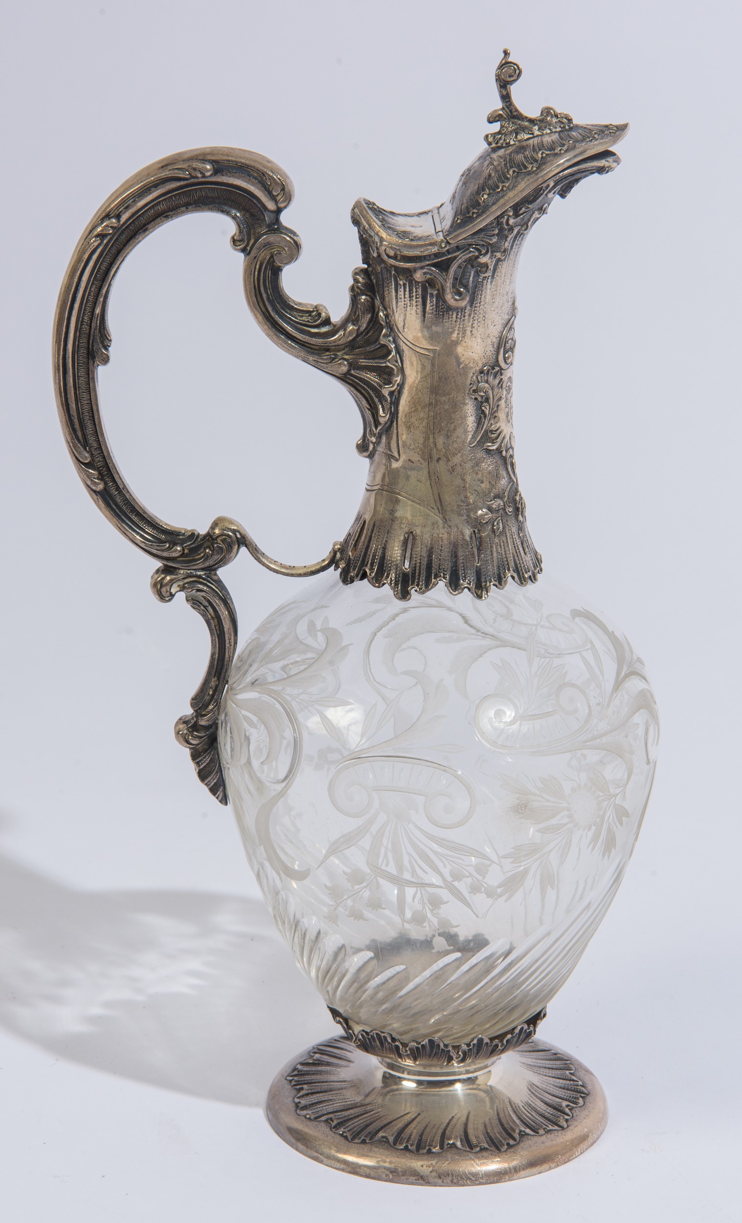 Cinque bottiglie in vetro e argento