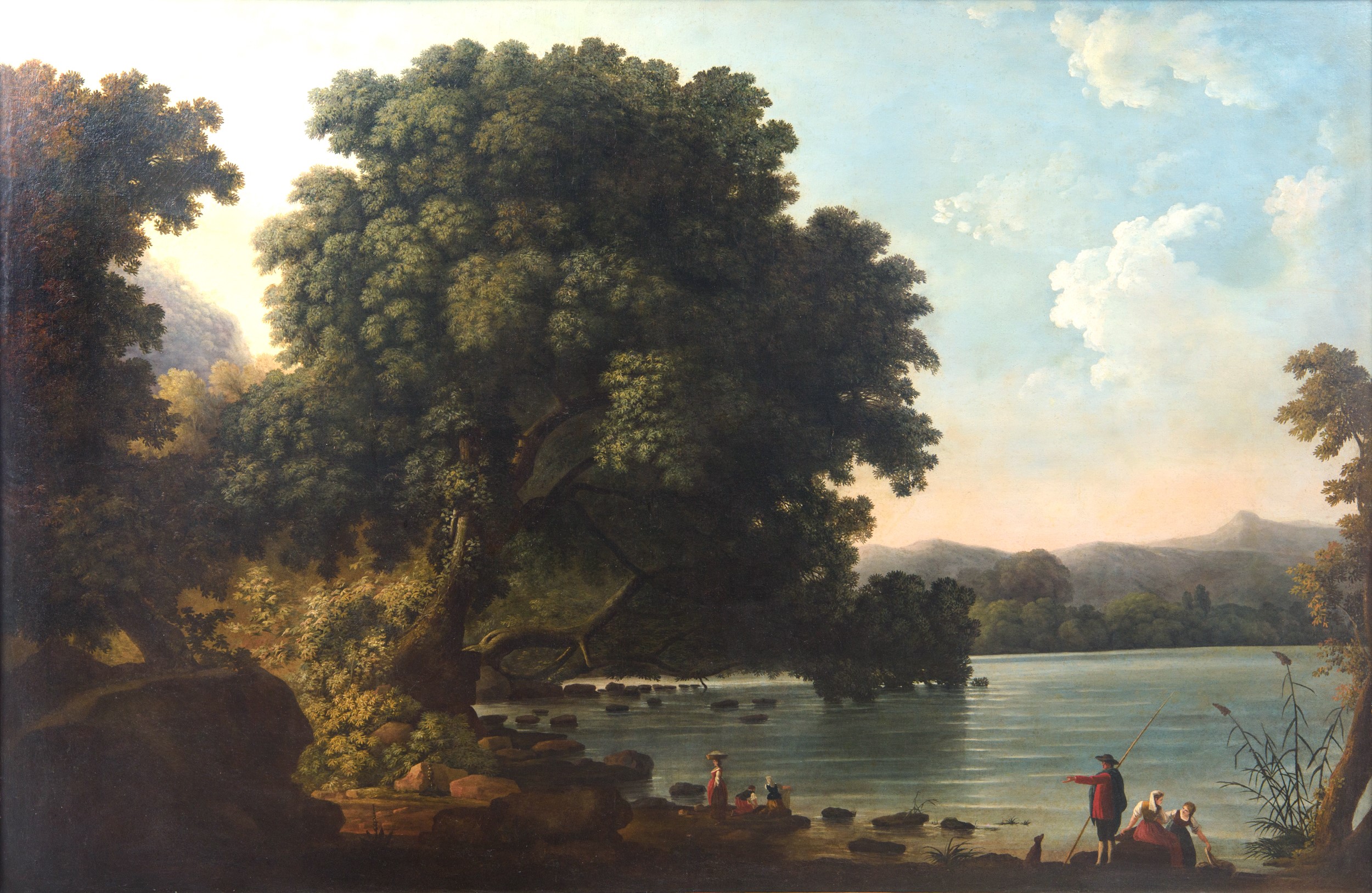 Paesaggio lacustre con quinta arborea e scorcio collinare