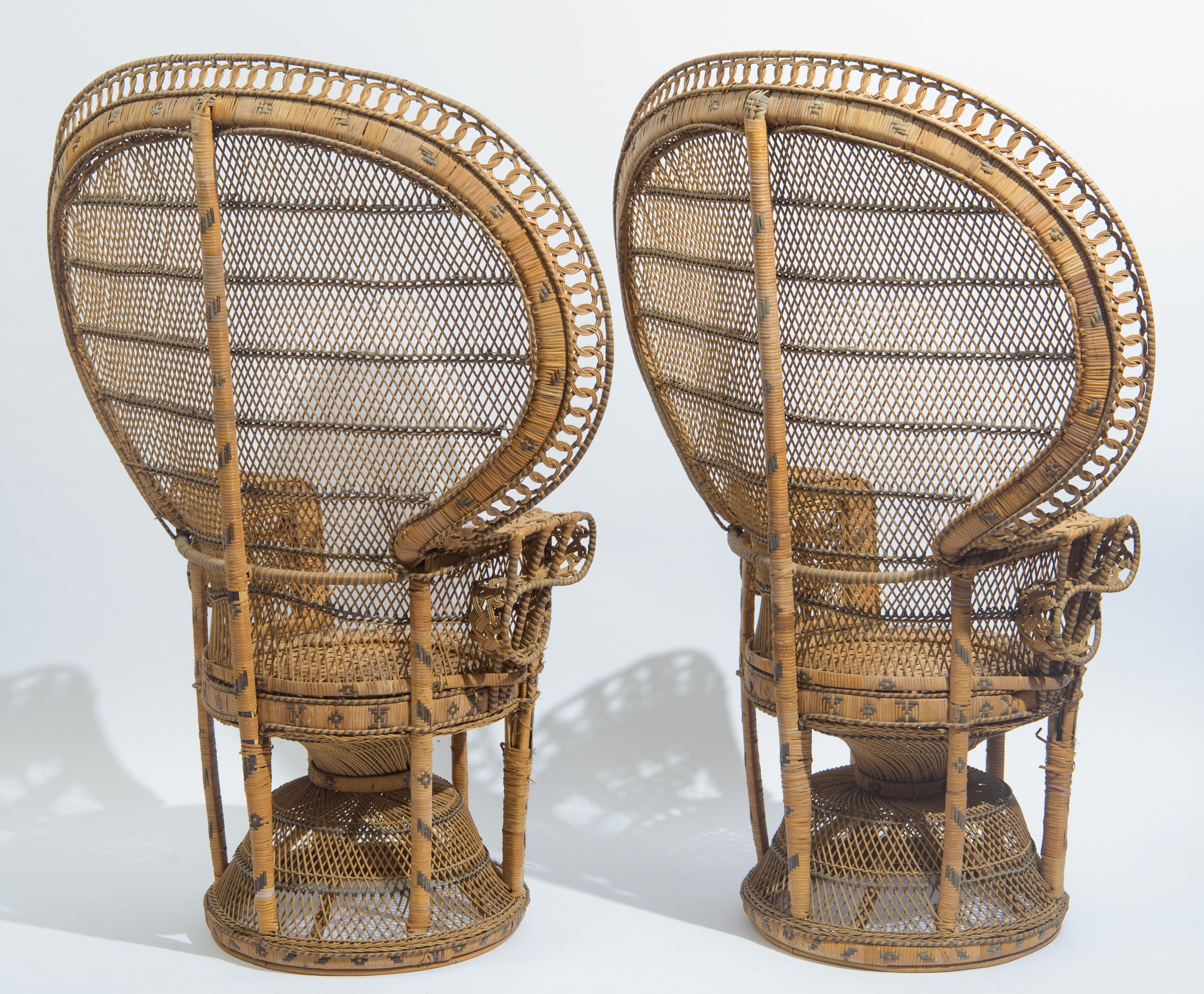 Coppia di poltrone modello "Peacock"