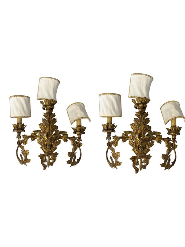 Coppia di appliques a tre luci