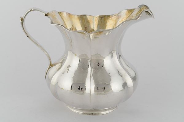 Silver pouring jug