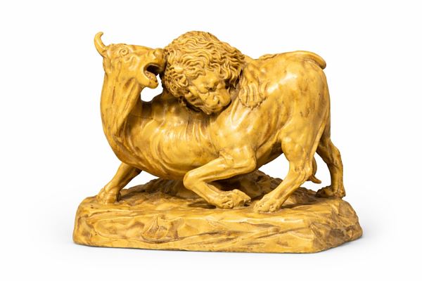 Scultura raffigurante lotta tra fiere