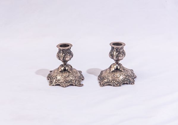 Coppia di candelieri in argento