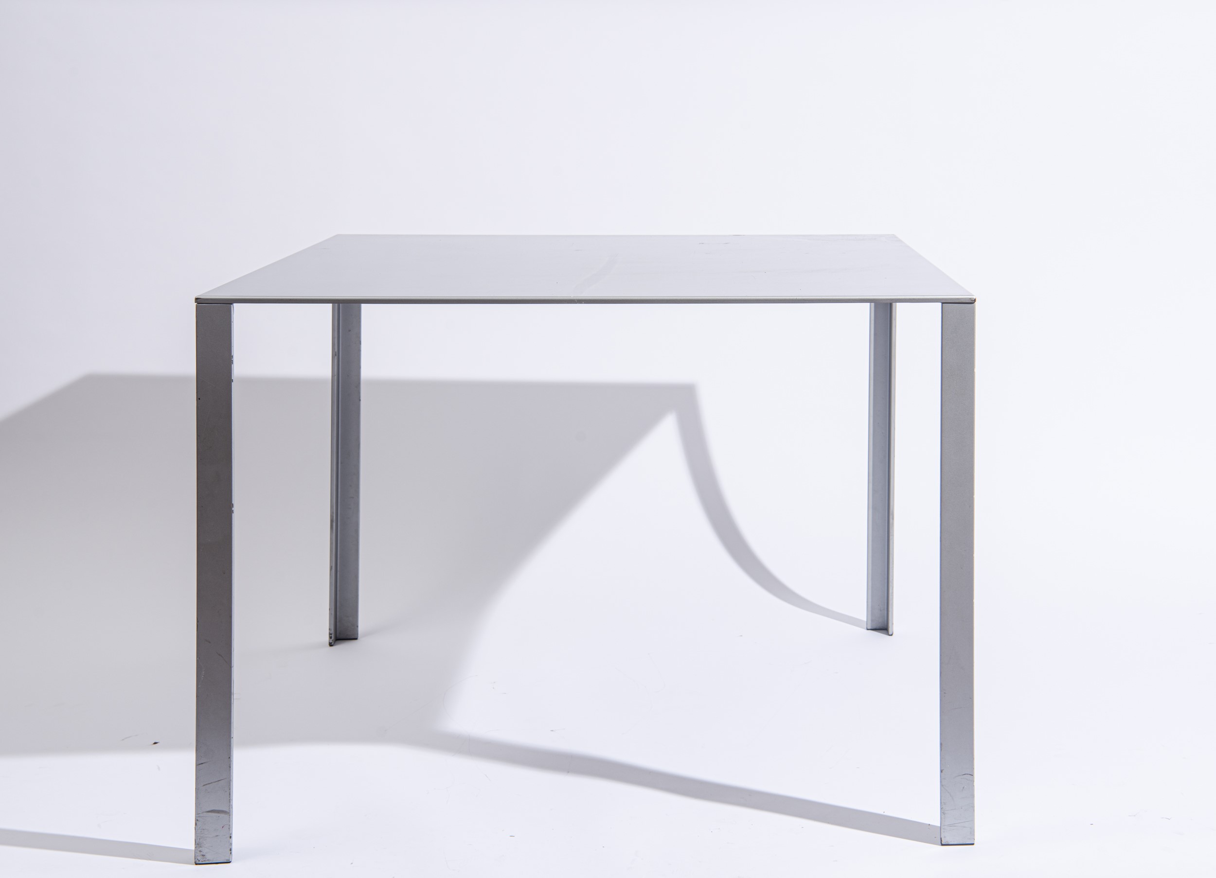 Jean Nouvel - Coppia di Tavoli mod. 'Less', metallo, 1993