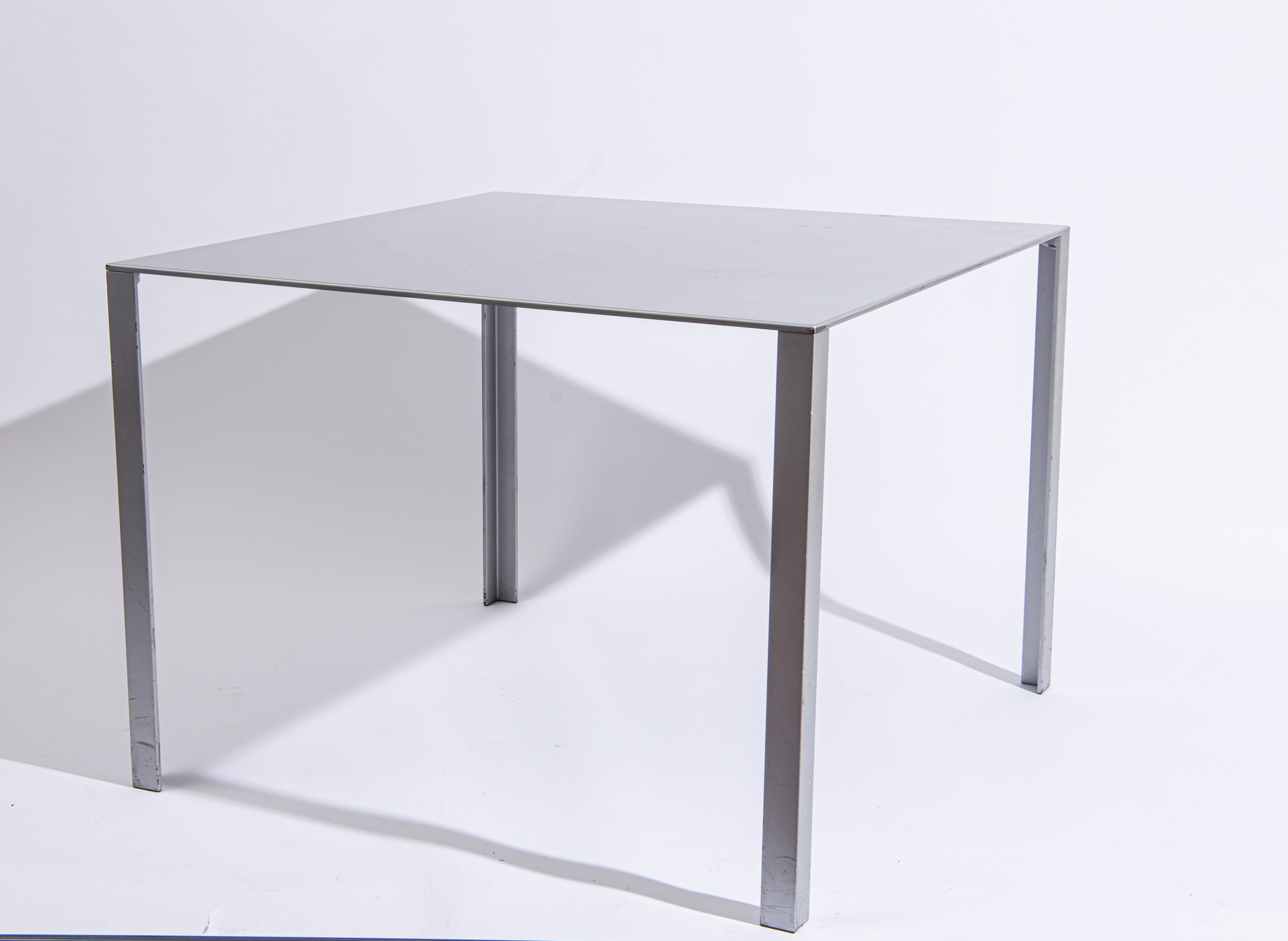 Jean Nouvel - Coppia di Tavoli mod. 'Less', metallo, 1993