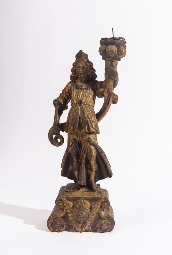 Scultura porta torciere