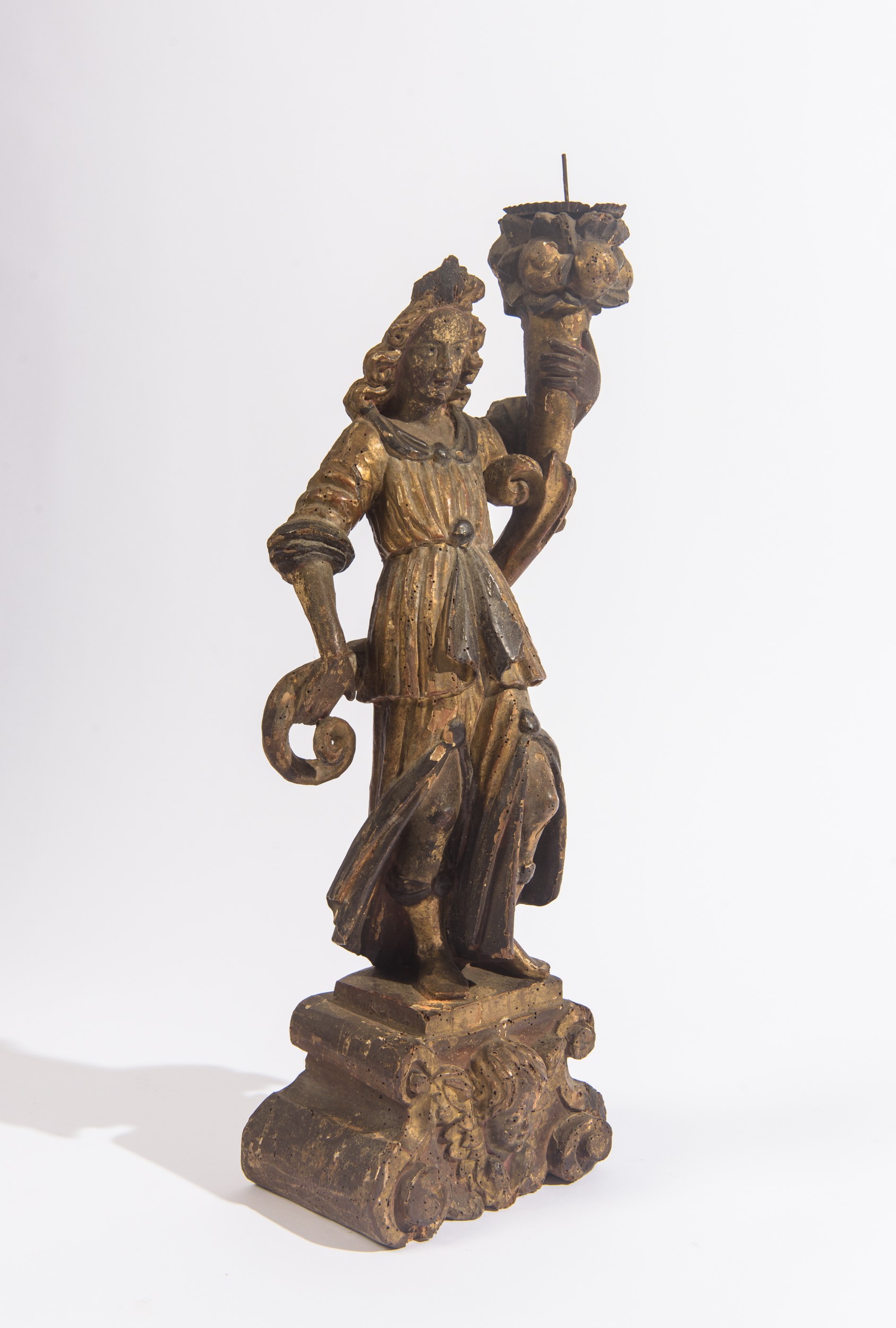 Scultura porta torciere