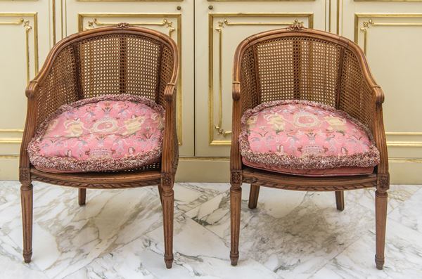 Coppia di poltroncine a pozzetto