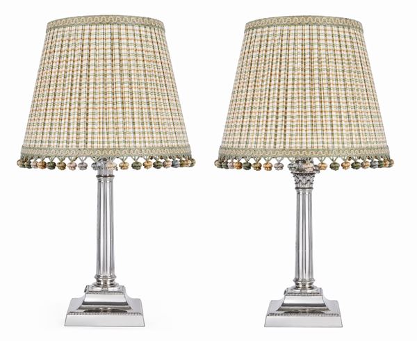 Coppia di lampade in bronzo argentato