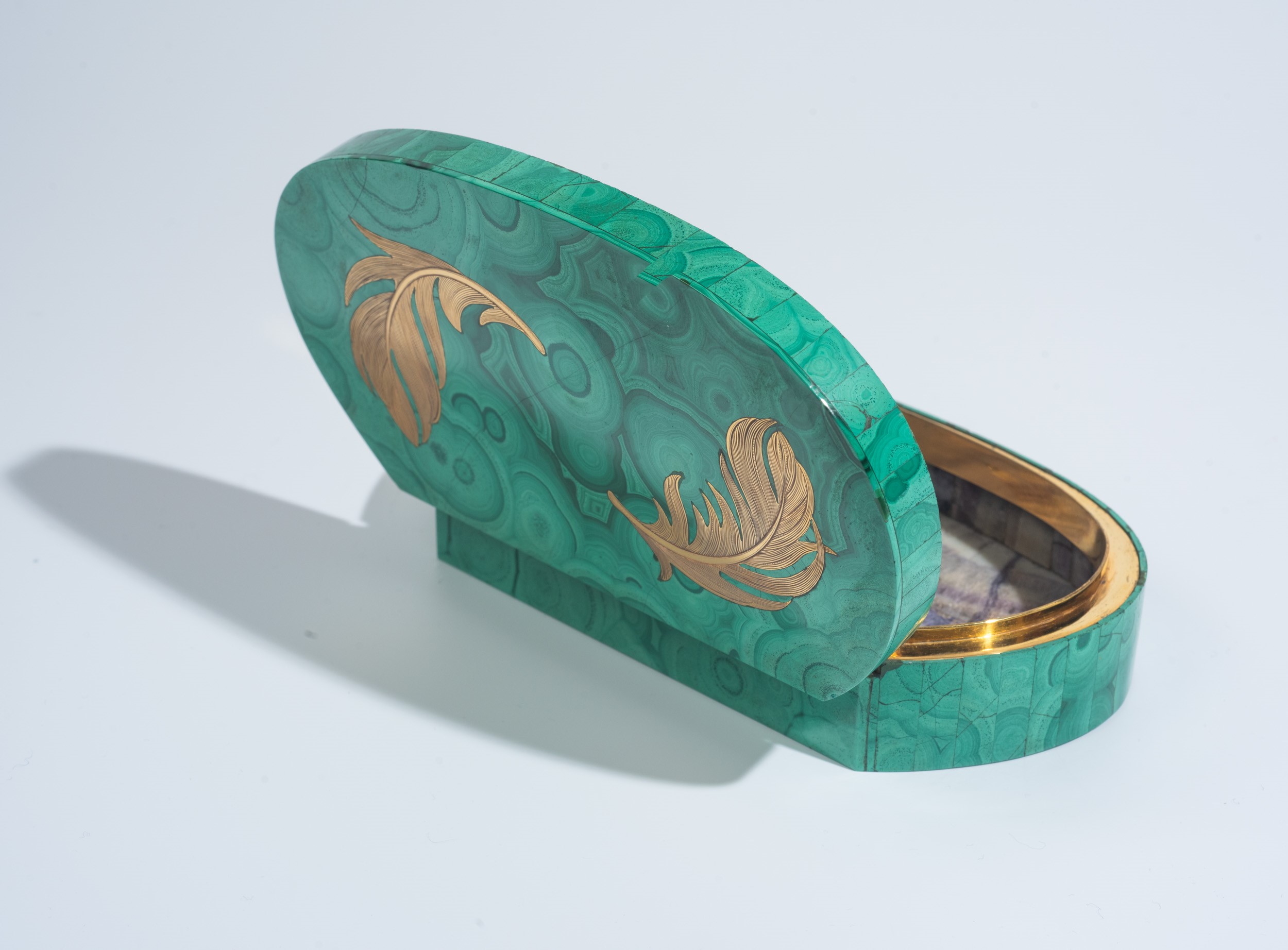 Tre scatole e un vasetto in argento e malachite