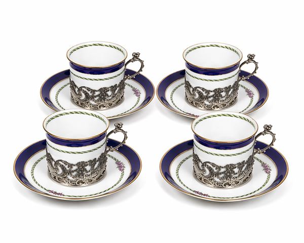 Quattro sotto tazzine in argento