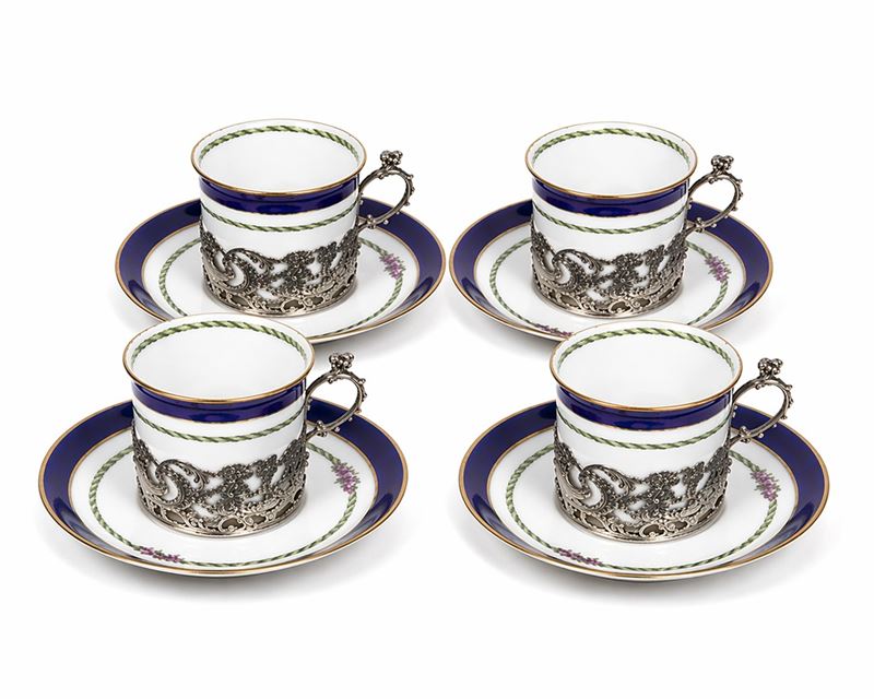 Quattro sotto tazzine in argento