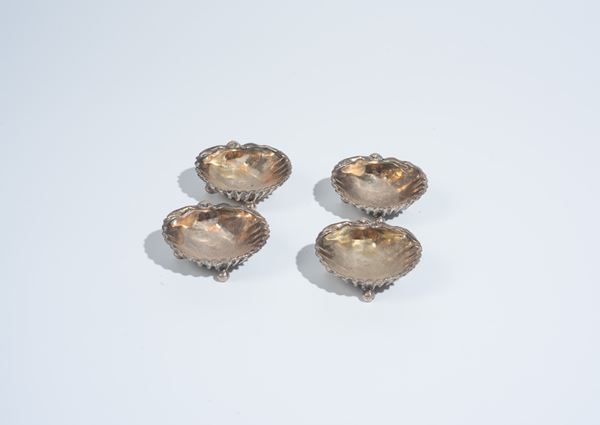 Quattro saliere a forma di conchiglia in argento 800
