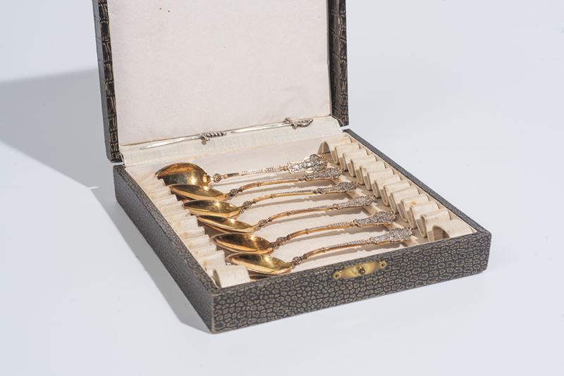 Sette cucchiaini in argento vermeil