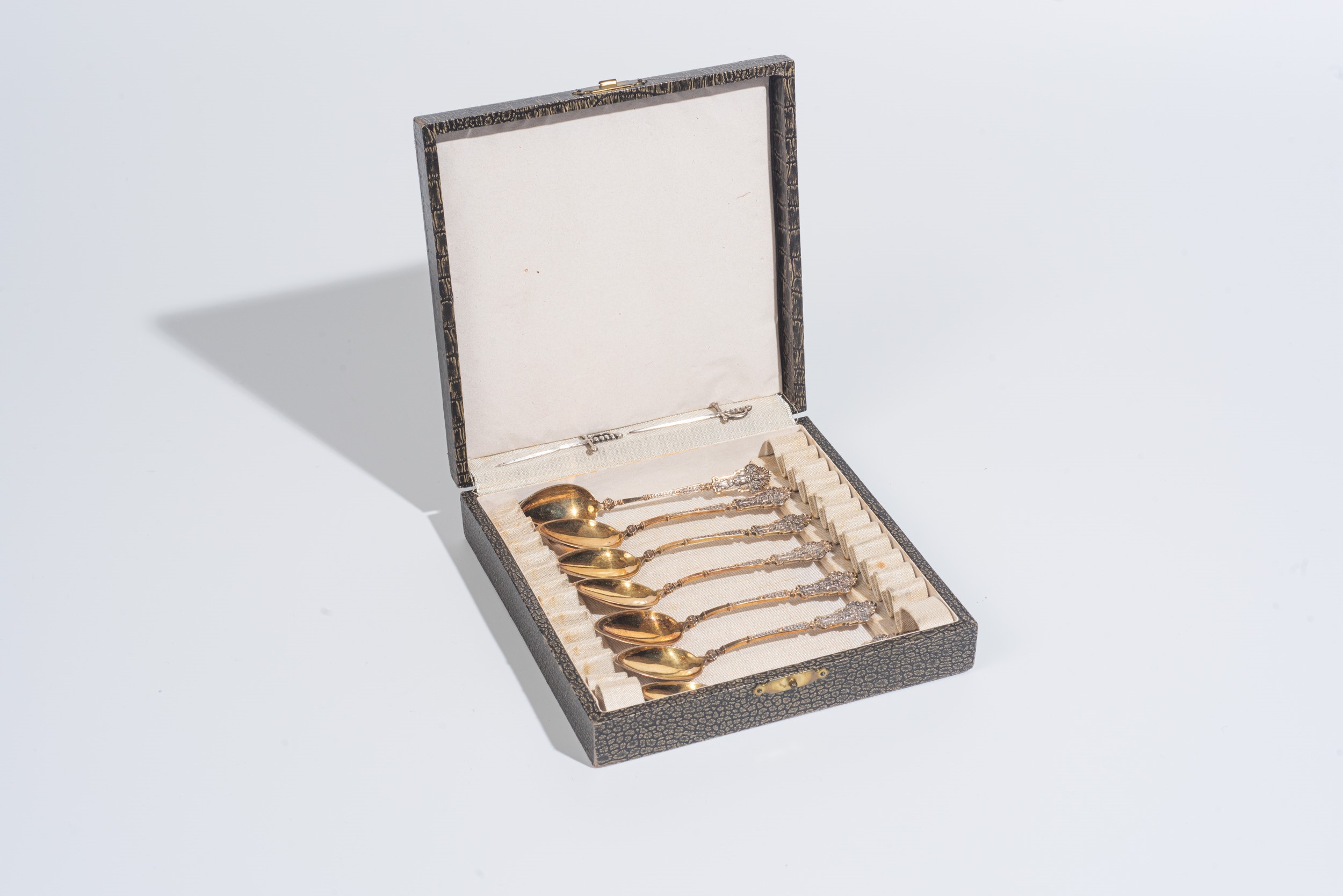 Sette cucchiaini in argento vermeil