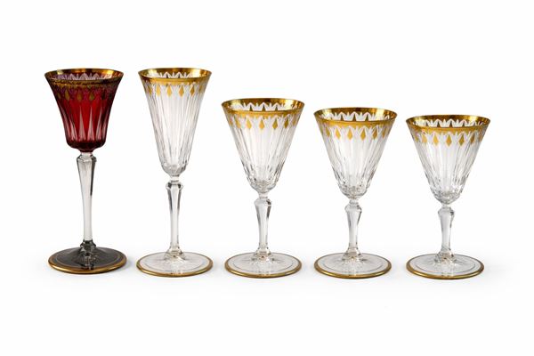 Servizio di bicchieri in cristallo molato e dorato