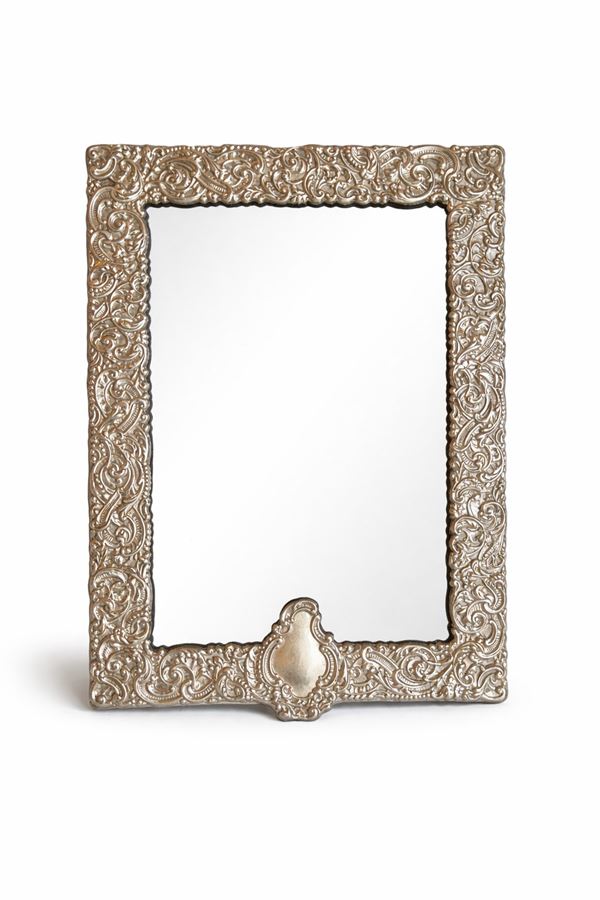 Cornice in lamina d'argento con specchio