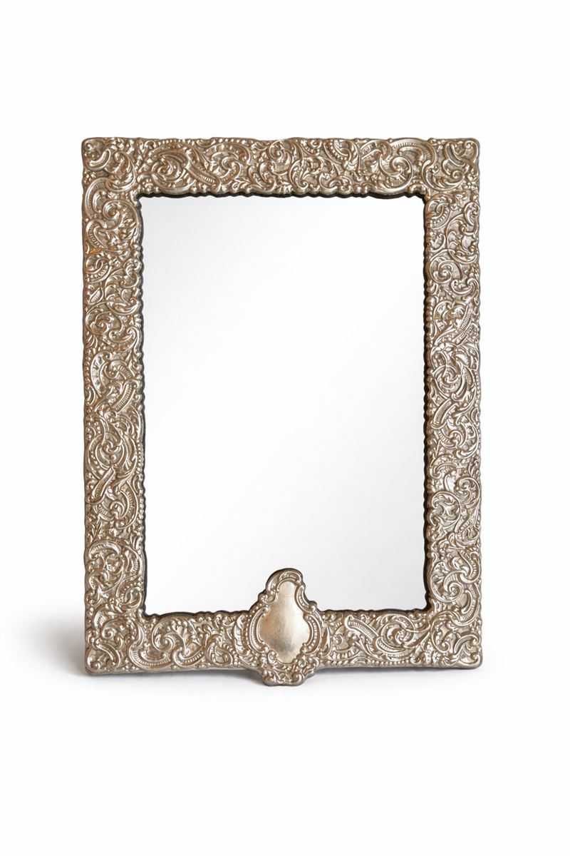 Cornice in lamina d'argento con specchio