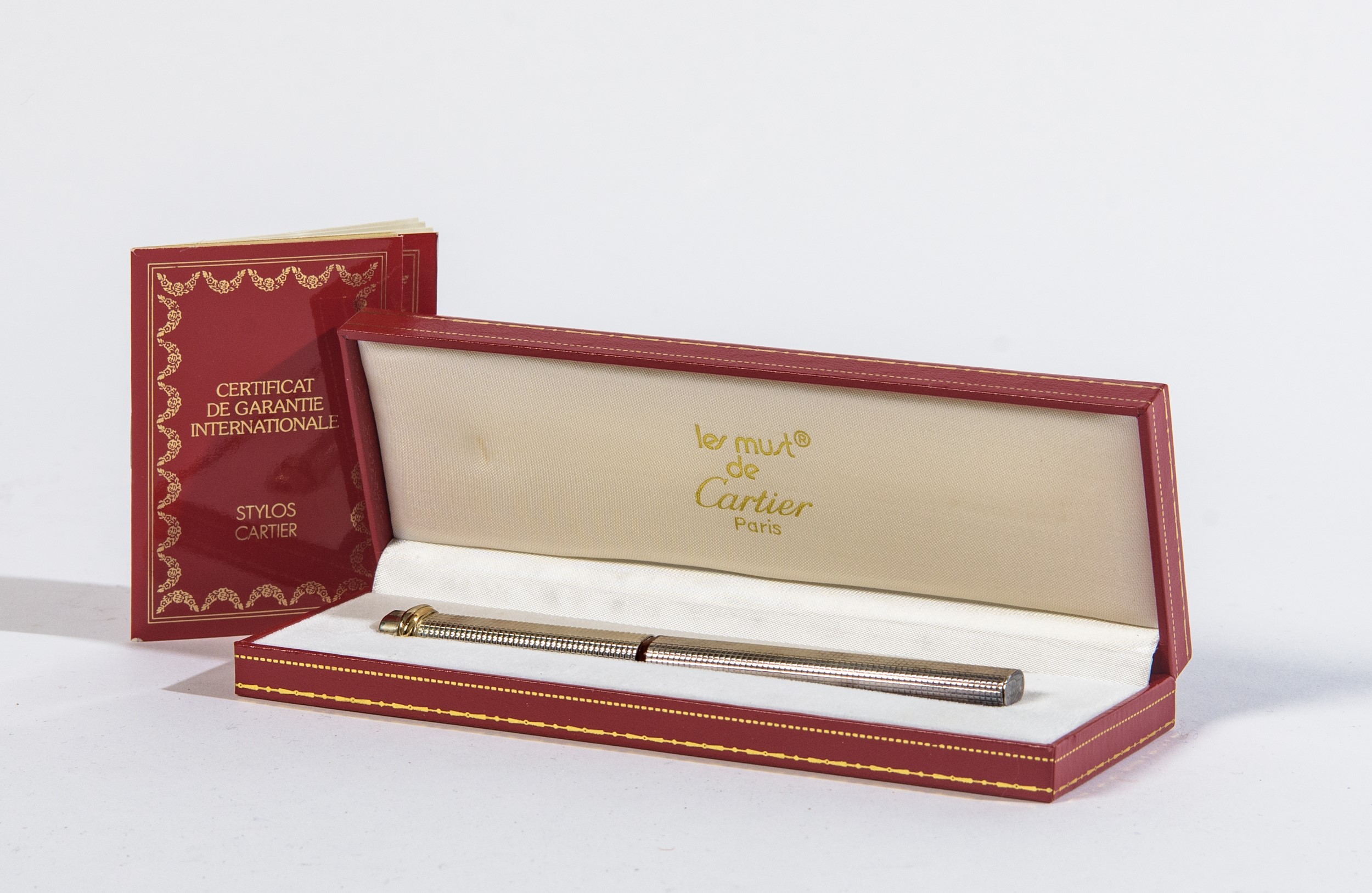 Cartier, Penna biro 'Les Must', placcata in argento