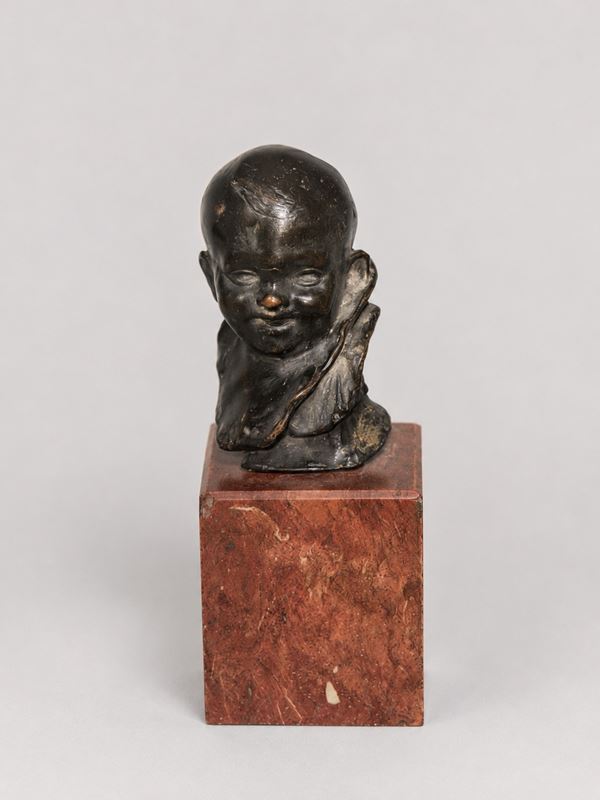 Scultura raffigurante testa di fanciullo