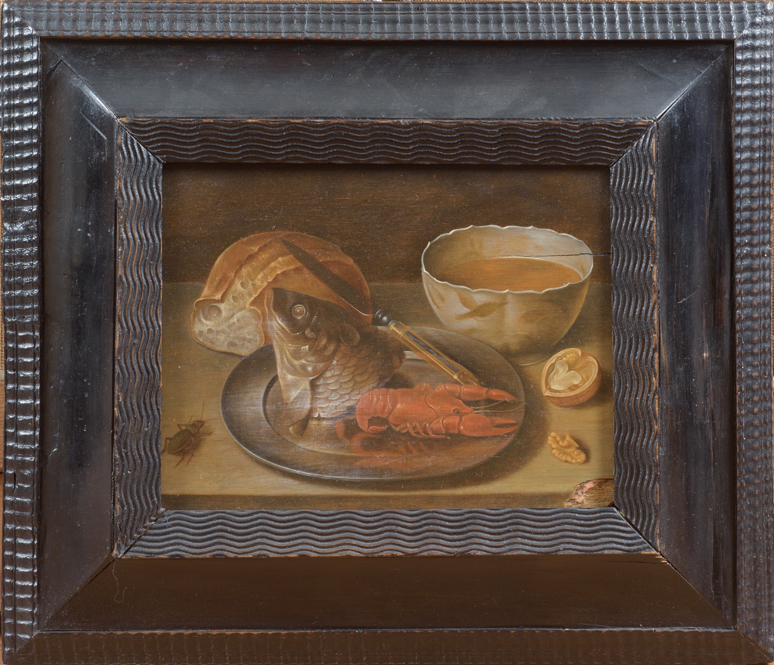George Flegel - Natura morta con pesce, aragosta, zuppa, pane, noce e scarafaggio