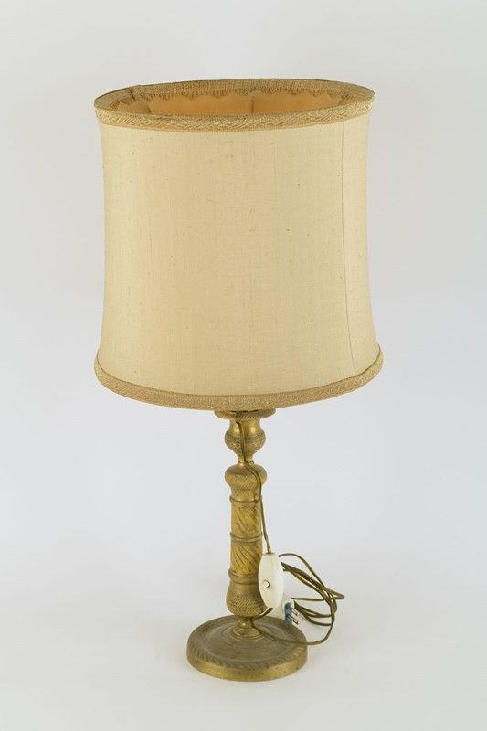 Candlestick in gilded bronze