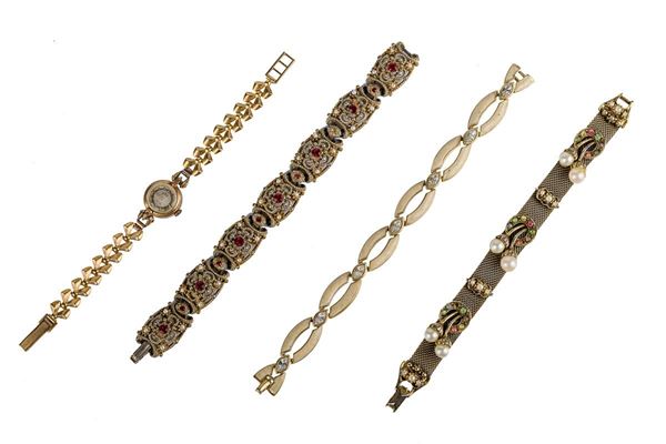 Lotto di tre bracciali ed un orologio 
