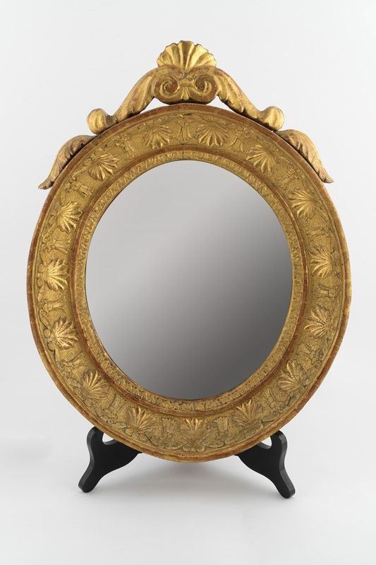 Mirror in carved and gilded wood